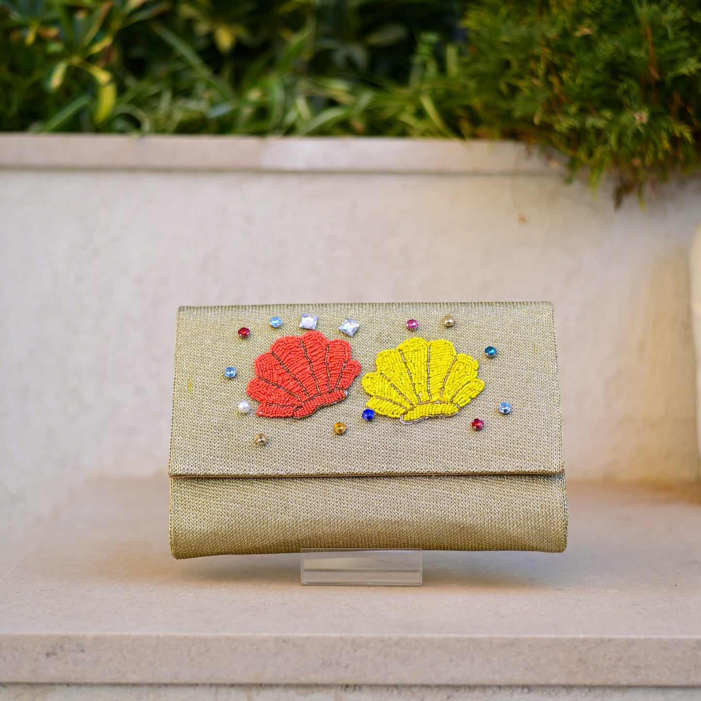 Shell embroidered clutch